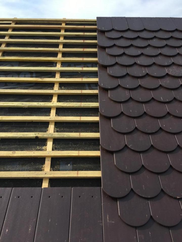 Pose et remplacement de la couverture et des éléments de zinguerie.